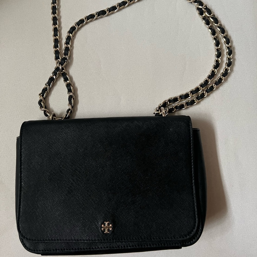 Black Tory Burch shoulder bag with black and gold chain strap front closure